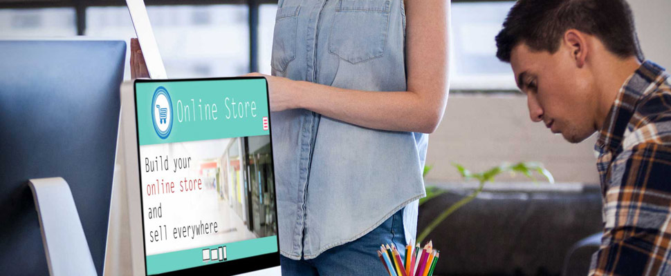 Screen of an online store against team of business people working together in office