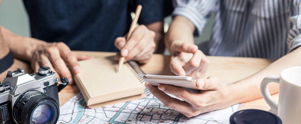 Young couple planning vacation trip Young couple planning vacation trip