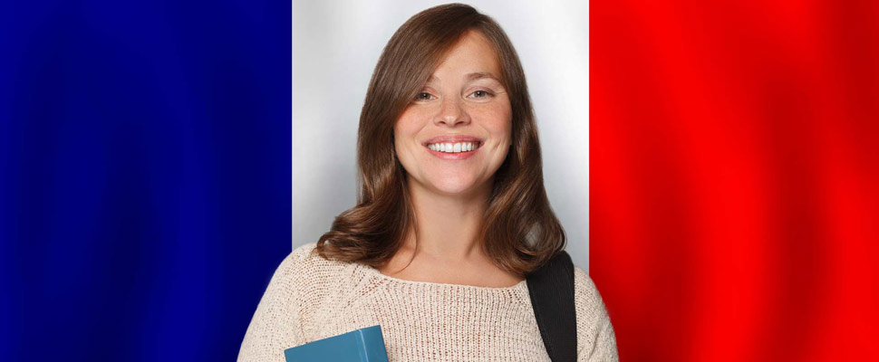 Pretty woman student against French flag background. Travel, edu Pretty woman student against French flag background. Travel, edu