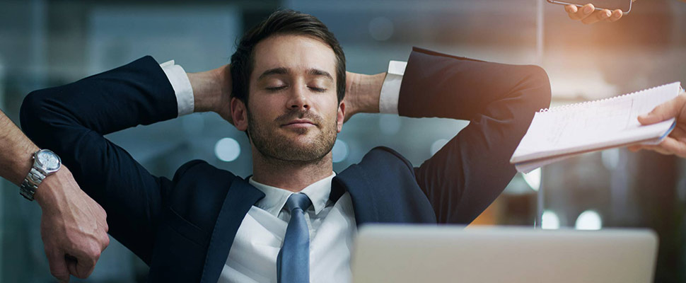 Businessman, calm and relax with chaos in office with multitaski