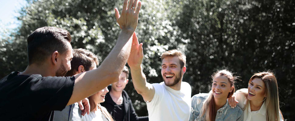 best friends give each other a high five. best friends give each other a high five.