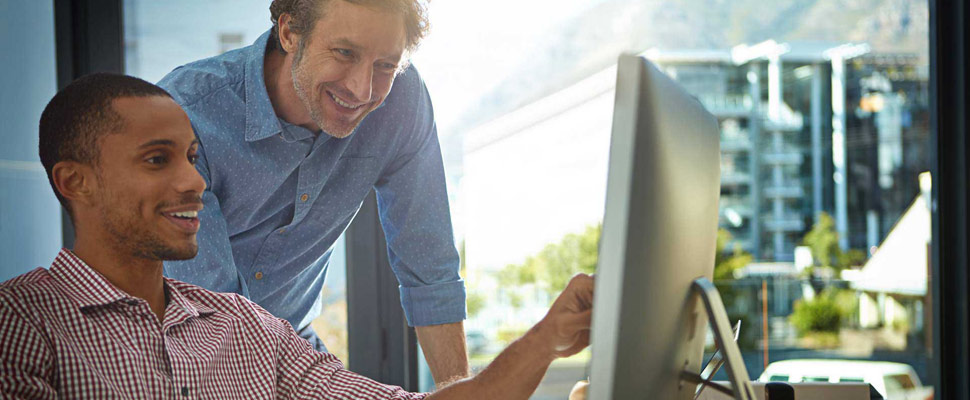 Business, computer and men talking, digital marketing and update Business, computer and men talking, digital marketing and update