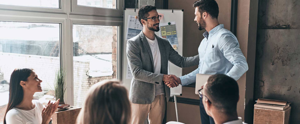 Great presentation! Group of business people clapping and smili Great presentation! Group of business people clapping and smili