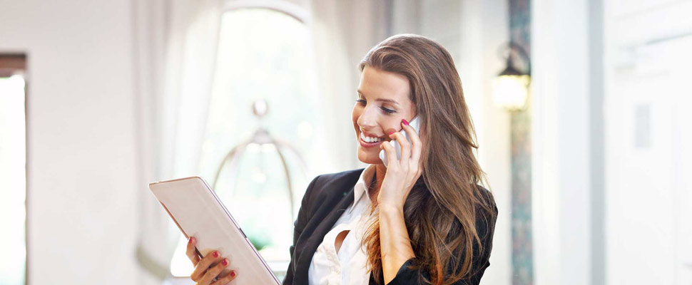 Young businesswoman working in lobby