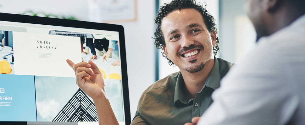 Can you see what Im referring to. Shot of two young businessmen